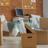 Boxes in a college dorm room